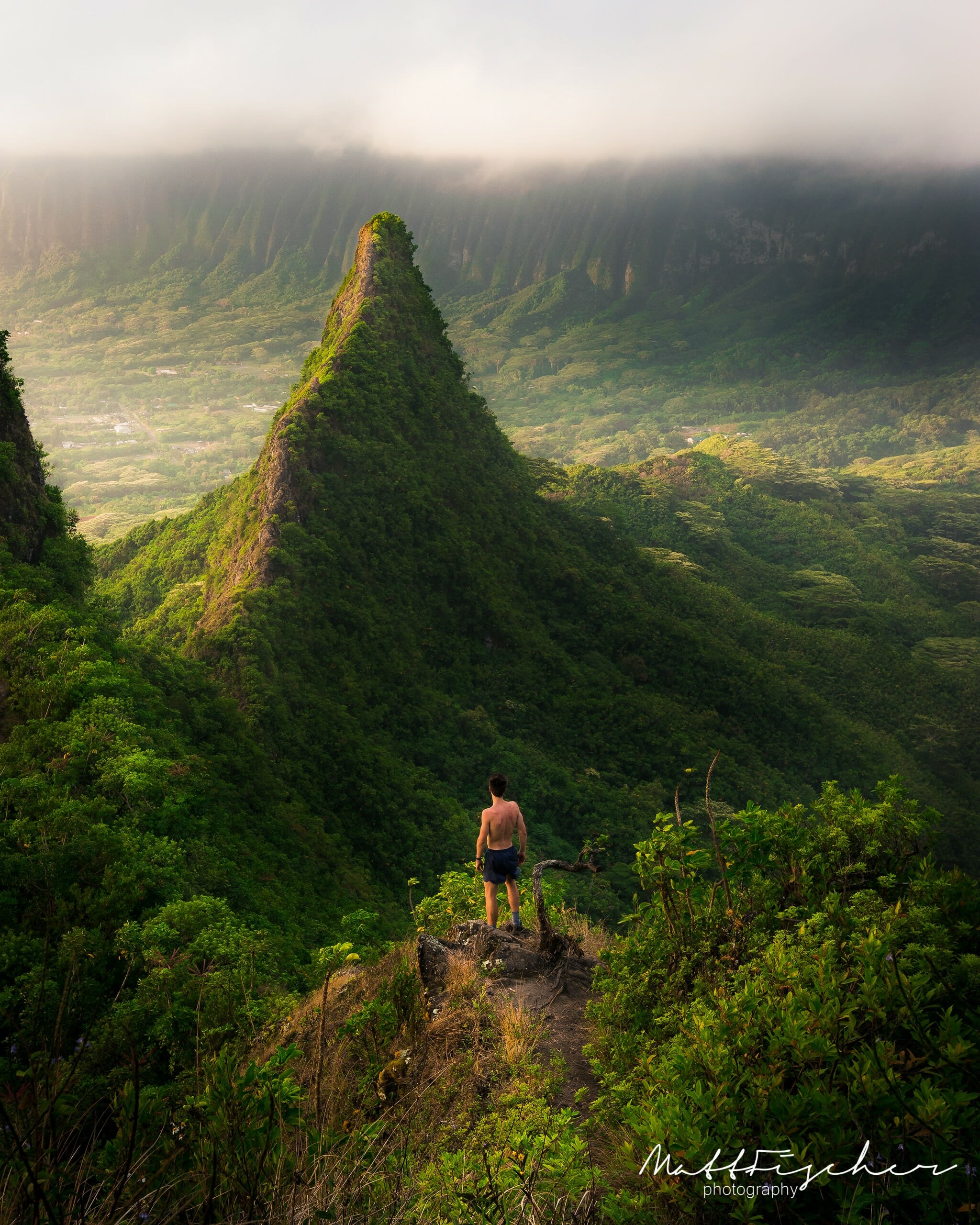 A hiker on the Olomana or the Three Peaks Trail in Oahu, Hawaii